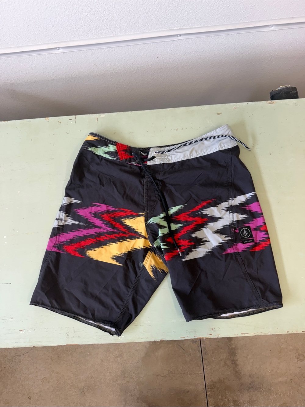 Volcom Men’s Black Boardshorts with Pink Red Yellow Green Aztec Stripe